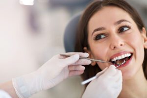 A dental cleaning allows dentists to spot early signs of issues. Early detection can save teeth and gums from more severe problems.